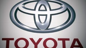 Japan's Toyota raises its profit outlook after solid earnings helped by a weak yen