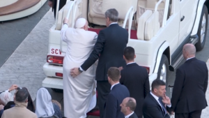 Pope Francis appears unable to climb steps to popemobile following weekly general audience